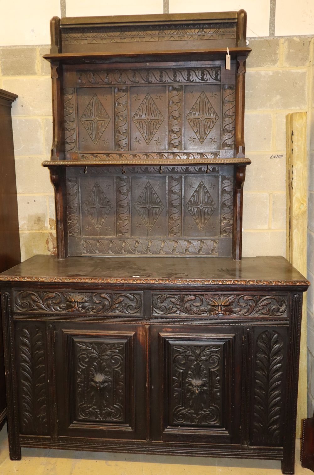 A large Flemish oak sideboard with rack made from old timbers, W.150cm, D.60cm, H.232cm